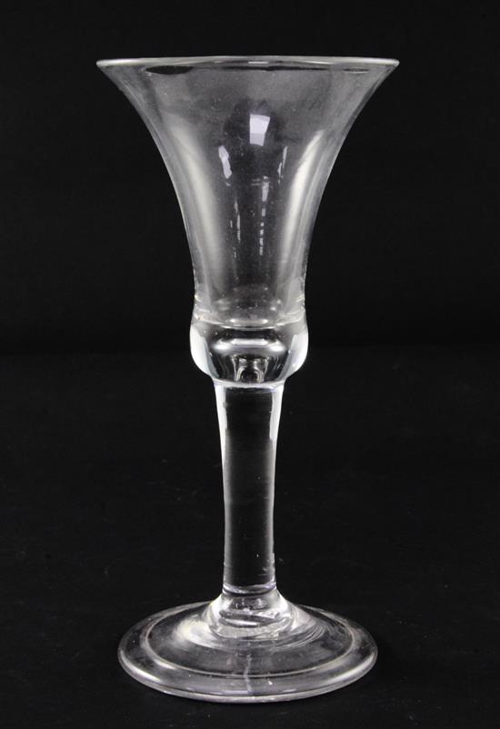 A glass goblet, c.1735, 19cm
